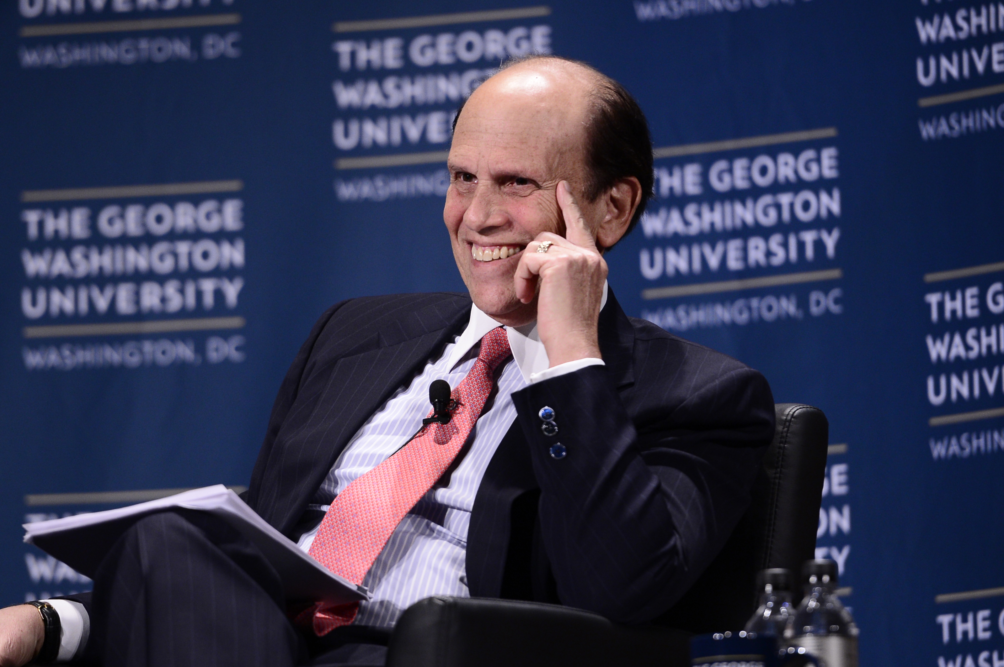 Michael Milken, a top GW benefactor, onstage at a university event in New York City.