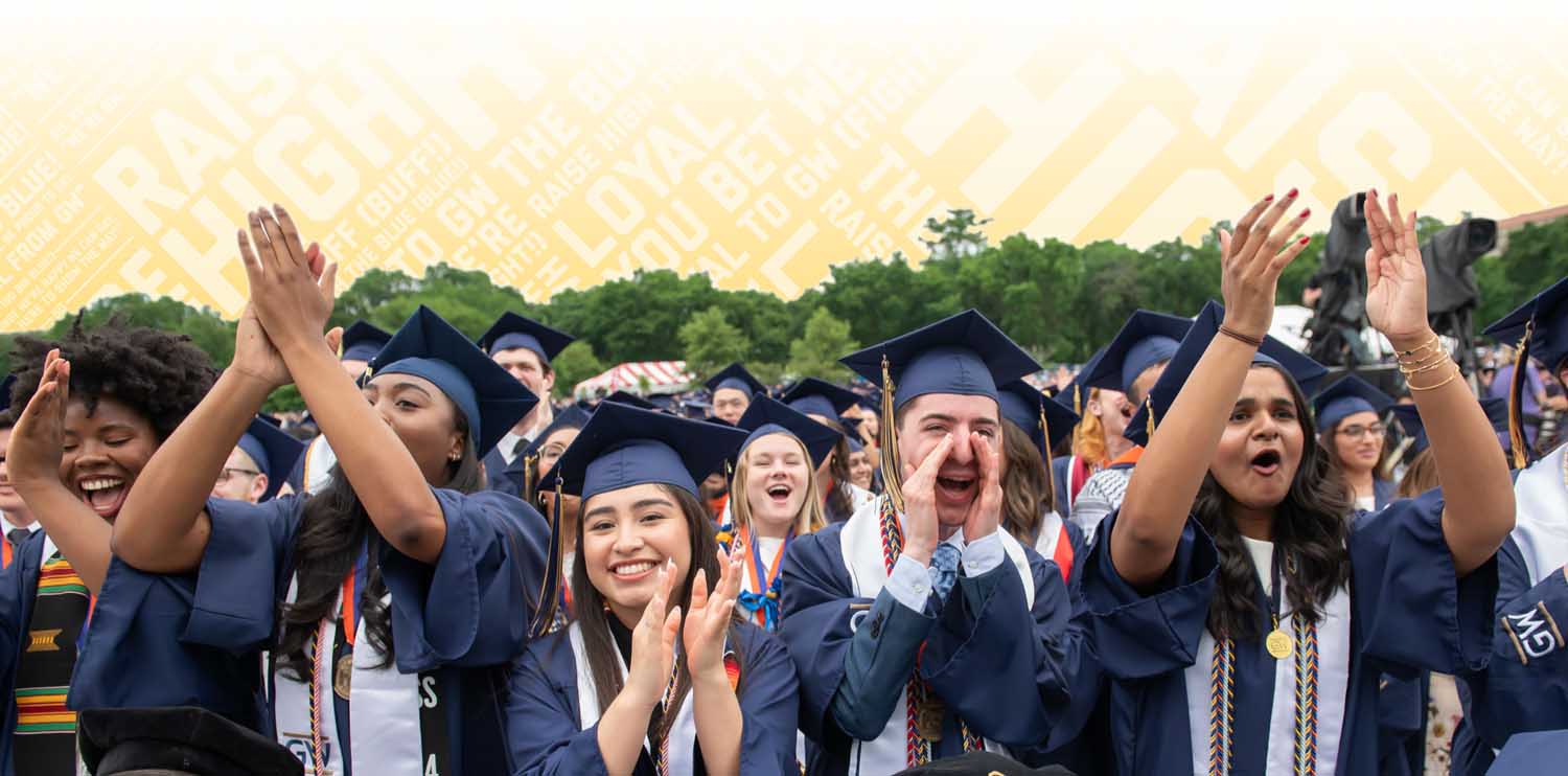Students in regalia celebrating graduation on the National Mall